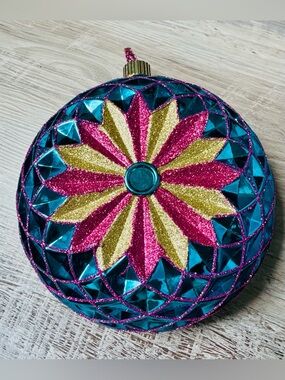 Vickerman. A bright, beautiful, double-sided plastic Christmas ornament, 9 inche